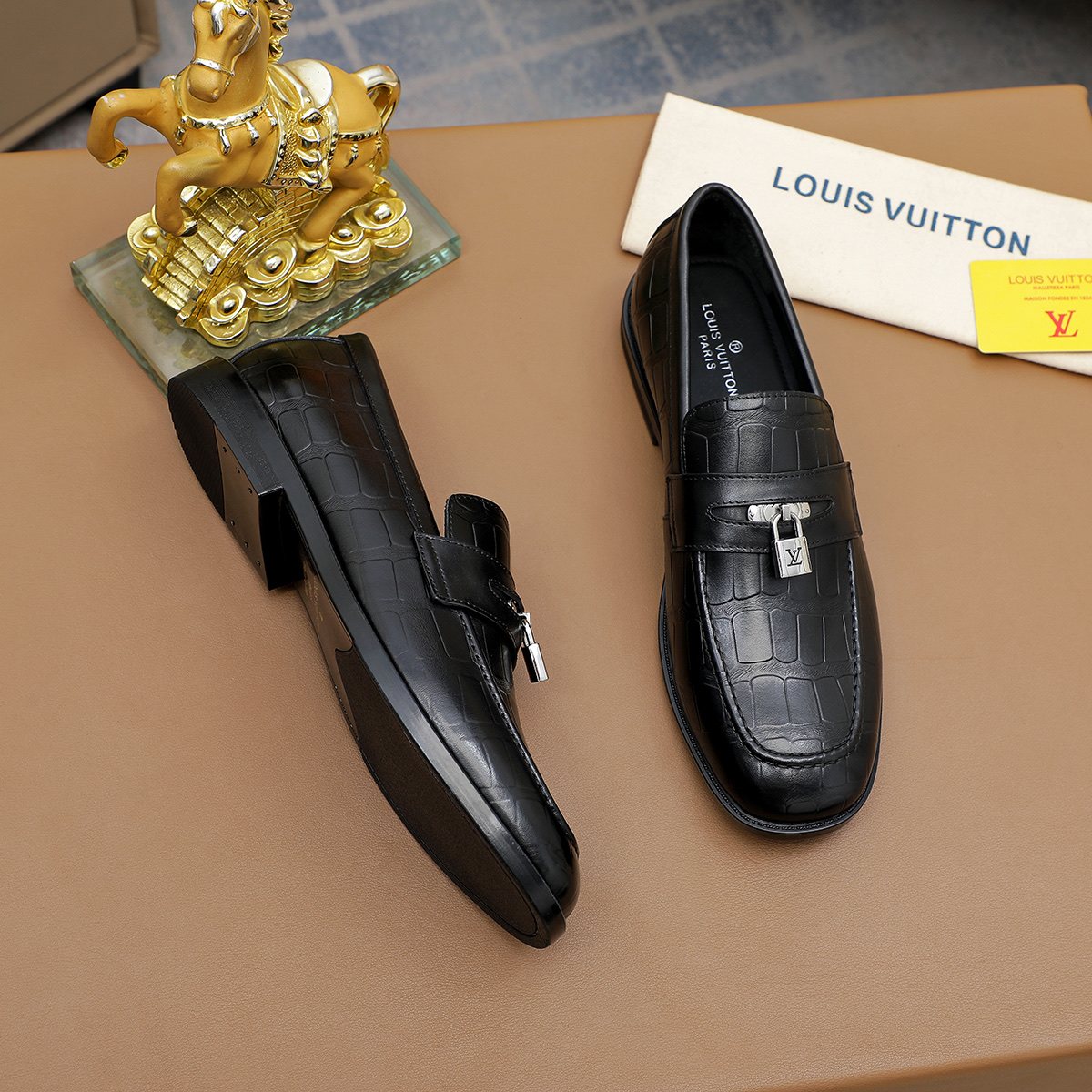 Louis Vuitton Embossed Bar Loafers - Black